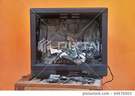 Old TV smashed to pieces 84676803