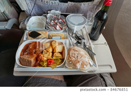 Airline food on the tray 84676851