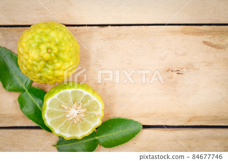 bergamot on wood background 84677746