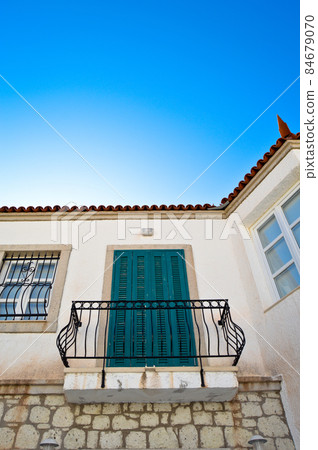 Cesme Alacati located in old antique house blue wooden windows and shutters, Turkey Izmir Cesme Alacati located in old antique house blue wooden windows and shutters, Turkey Izmir 84679070