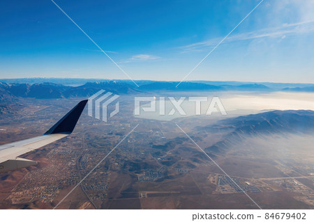 Aerial view of the Utah Lake and city around Aerial view of the Utah Lake and city around 84679402