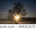 Hakuba village in winter, shining light in the morning mist 84682879