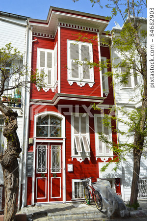 Princes Islands, Buyukada in Istanbul, old wooden red and white houses in Buyukada 84682903