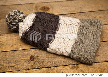 Handmade wool knitted winter brown and white hat 84685850
