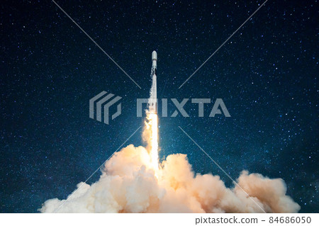 Space rocket launch, ship. Concept of business product on a market. Spaceship takes off in the starry sky. Rocket space ship . Mixed media 84686050