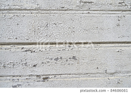 Cracked peeled white paint background on old wooden floor, cracked paint pattern Cracked peeled white paint background on old wooden floor, cracked paint pattern 84686081