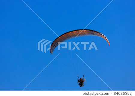 Paragliding blue sky 84686592
