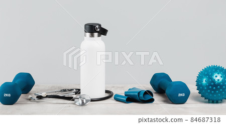 Healthy lifestyle blue sports accessories and water bottle Healthy lifestyle blue sports accessories and water bottle 84687318