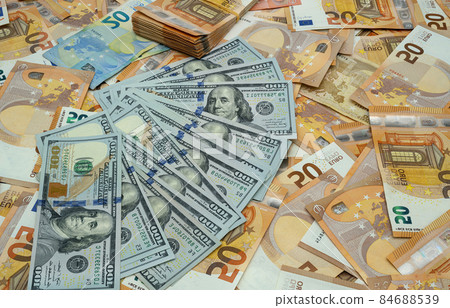 Banknotes of 50 euros and 100 dollars bills as background. Corruption concept 84688539