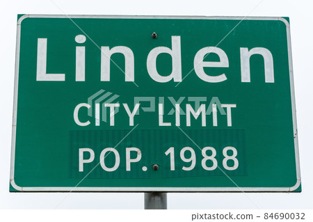 Linden city limit road sign 84690032