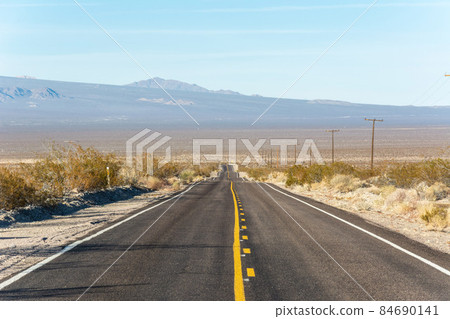 Road in the Mojave Desert in California. Road in the Mojave Desert in California. 84690141