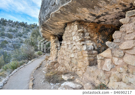 Prehistoric cliff dwelling in Walnut Canyon National Monument in Arizona 84690217