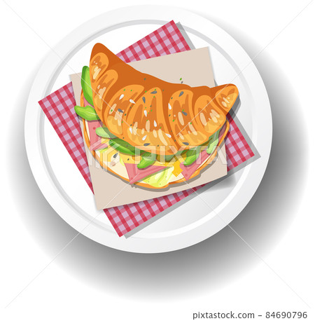 Breakfast croissant sandwich on white plate Breakfast croissant sandwich on white plate 84690796