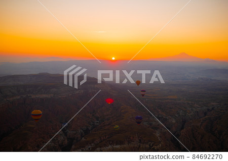 Bright hot air balloons in sky of Cappadocia, Turkey 84692270