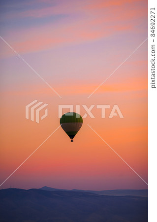 Bright hot air balloons in sky of Cappadocia, Turkey Bright hot air balloons in sky of Cappadocia, Turkey 84692271