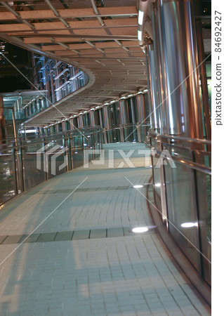 Modern pedestrian walkway in midtown of Hong Kong city 18 Sept 2004 84692427