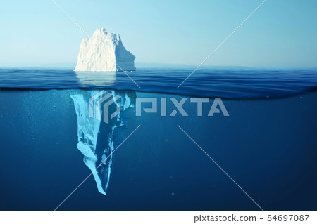 Iceberg in clear blue water and hidden danger under water. Iceberg - Hidden Danger And Global Warming Concept. Floating ice in ocean. Copyspace for text and design 84697087