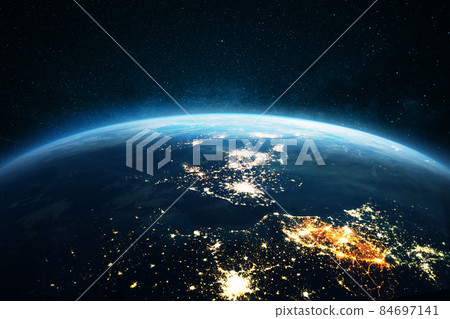 Amazing blue planet earth with night city lights on the starry sky in space. Great Britain, London view from space. Electricity and power supply concept Amazing blue planet earth with night city lights on the starry sky in space. Great Britain, London view from space. Electricity and power supply concept 84697141