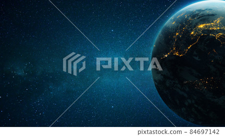 Amazing deep space with stars and a blue planet Earth with city lights at night. Space for design and text. 84697142
