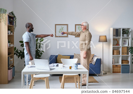 Elderly man holding rehabilitation after disease 84697544