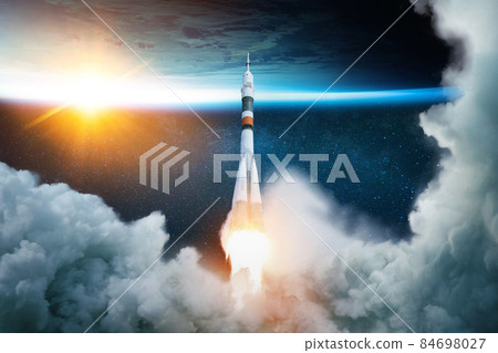 Rocket takes off into space with the planet. Spacecraft performs the space mission. Ship takes off into the starry sky. Rocket takes off into space with the planet. Spacecraft performs the space mission. Ship takes off into the starry sky. 84698027