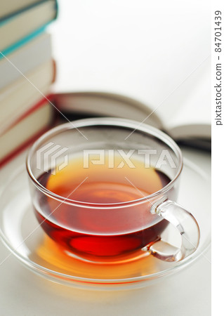 Tea and book 84701439