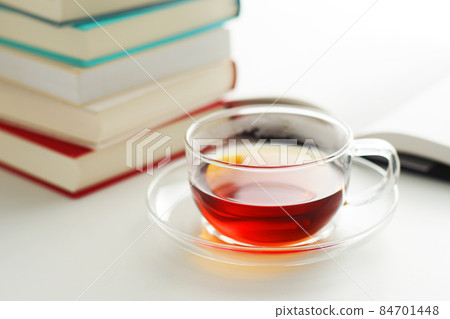 Tea and book Tea and book 84701448