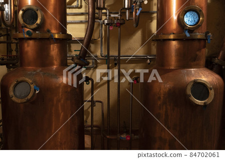 Copper alambic inside distillery Copper alambic inside distillery 84702061