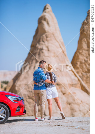 Happy couple on summer car vacation Happy couple on summer car vacation 84702183