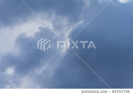 Gray overcast cloudy sky over horizon. Closeup clouds Gray overcast cloudy sky over horizon. Closeup clouds 84702788
