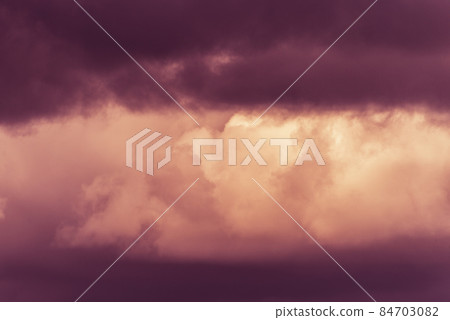 Twilight sky with effect of light pastel orange colors. Colorful sunset of soft clouds Twilight sky with effect of light pastel orange colors. Colorful sunset of soft clouds 84703082