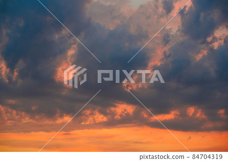 Dramatic sky at sunset with red, yellow and orange colors. Dramatic sky at sunset with red, yellow and orange colors. 84704319