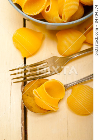Italian snail lumaconi pasta Italian snail lumaconi pasta 84704374