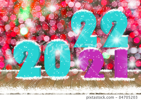 2022 Text on wood table top with snow and decorative light bokeh background 2022 Text on wood table top with snow and decorative light bokeh background 84705203
