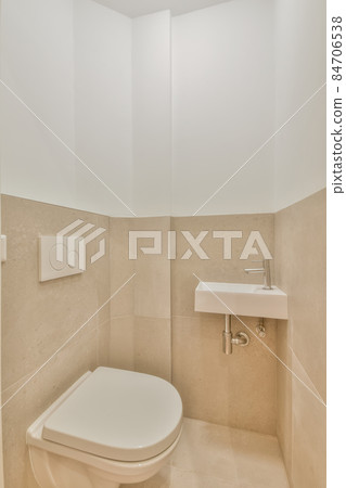 Interior of small clean restroom in miniature style 84706538