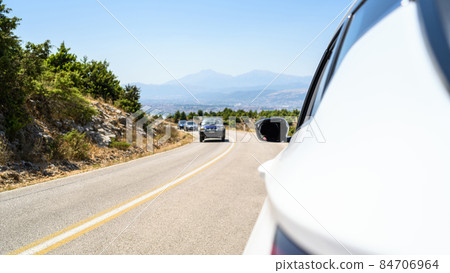 Car on the serpentine mountains road Summer trip vacation. Freedom concept. copy space Car on the serpentine mountains road Summer trip vacation. Freedom concept. copy space 84706964