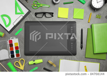 Flat lay composition with tablet and different office items on white background Flat lay composition with tablet and different office items on white background 84708144