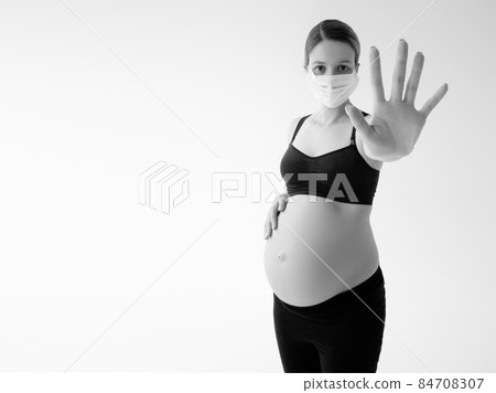 Pregnant woman wearing face mask protective for Pregnant woman wearing face mask protective for 84708307