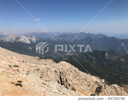 Beautiful landscape view from a high mountain to the forest and mountains in a tropical country with resorts and the sea 84708798