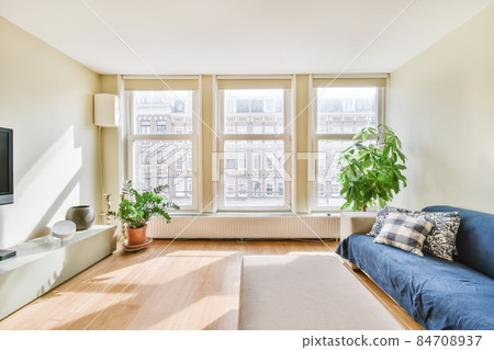 Cozy and bright living room in luxury apartment 84708937