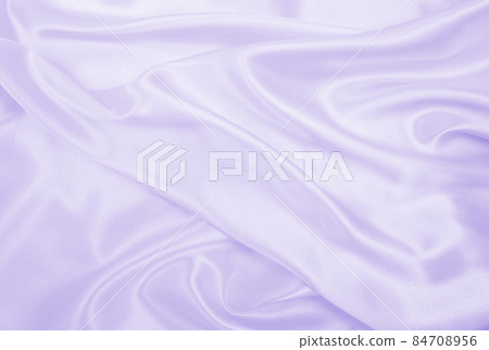 Smooth elegant lilac silk or satin texture as wedding background. Luxurious background design Smooth elegant lilac silk or satin texture as wedding background. Luxurious background design 84708956