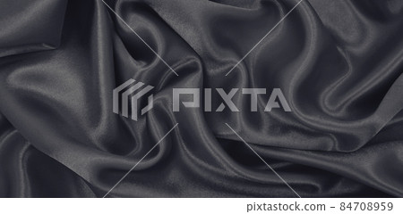 Smooth elegant brown silk or satin luxury cloth texture as abstract background. Luxurious background design wallpaper. In Sepia toned. Retro style Smooth elegant brown silk or satin luxury cloth texture as abstract background. Luxurious background design wallpaper. In Sepia toned. Retro style 84708959
