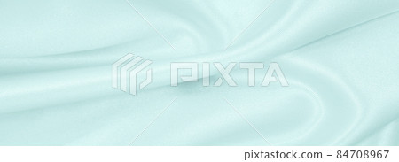 Smooth elegant blue silk or satin luxury cloth texture as abstract background. Luxurious background design Smooth elegant blue silk or satin luxury cloth texture as abstract background. Luxurious background design 84708967