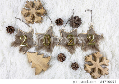 Christmas and New year concept. Christmas decorations on fluffy white background. Christmas and New year concept. Christmas decorations on fluffy white background. 84710051
