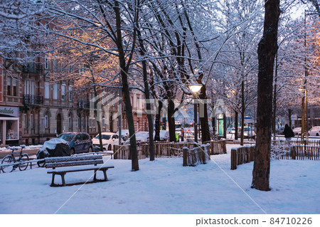 Strasbourg and velo under snow at winter 84710226