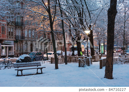 Strasbourg and velo under snow at winter 84710227