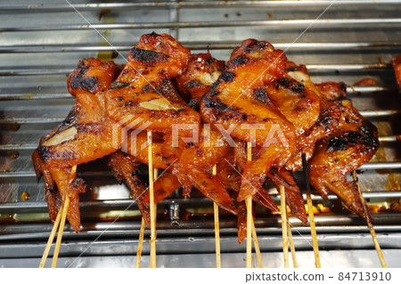 Roast chicken street food in thailand. 84713910