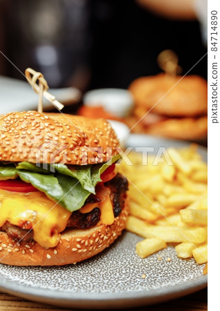 fries and sancwich combo on the plate 84714890