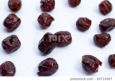 Sweet chinese jujube dessert on white background. Sweet chinese jujube dessert on white background. 84714907
