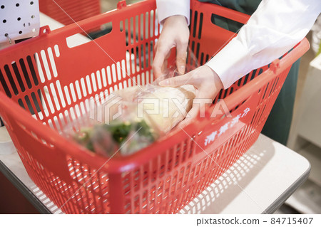 Supermarket cashier female hand Supermarket cashier female hand 84715407